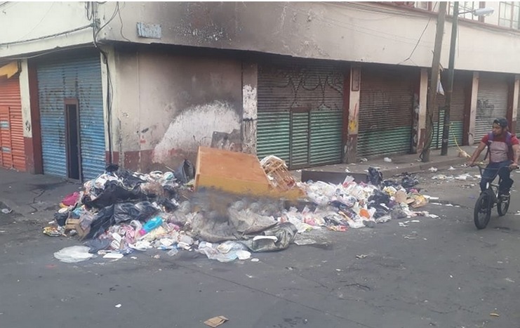 ¡Macabro hallazgo! Cuerpo envuelto en sábanas en Tepito sería de una mujer