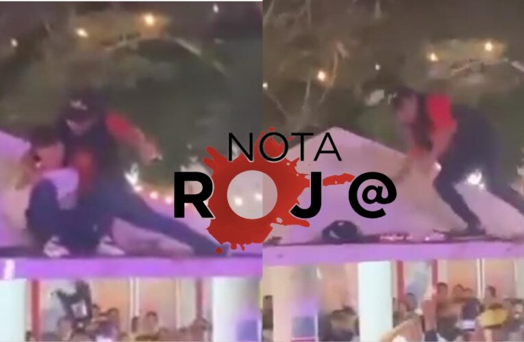 Guardia bañado en cerveza por bajar a joven ebrio en Feria Xmatkuil, Yucatán 