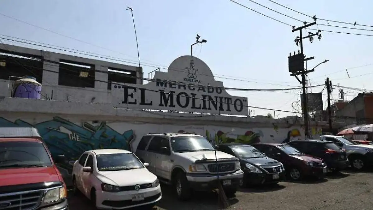 asesinato a balazos en mercado El Molinito